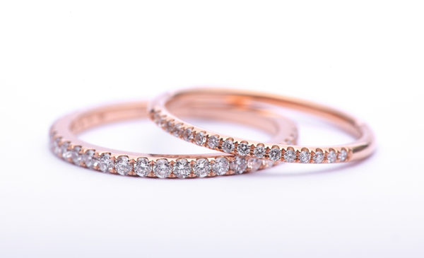 Rose Gold Diamond Wedding Bands set with a Saw set style