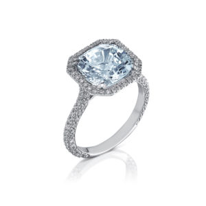 White Gold, Aquamarine and Diamond Engagement Ring. Emerald Cut Aquamarine set with Halo Saw set Diamonds